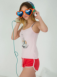 UhTeens presents: This doll really knows how to have fun with her and how she can show off her pussy and listen to some beats at the same time.
