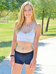 UhTeens presents: Sporty blonde babe Dakota strips her clothes and flaunts her hot body outdoors