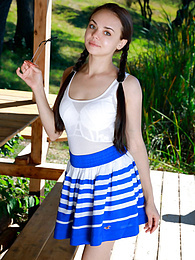 UhTeens presents: Fresh-Faced russian beauty Mia Grandy gets totally naked on a picnic table in a garden